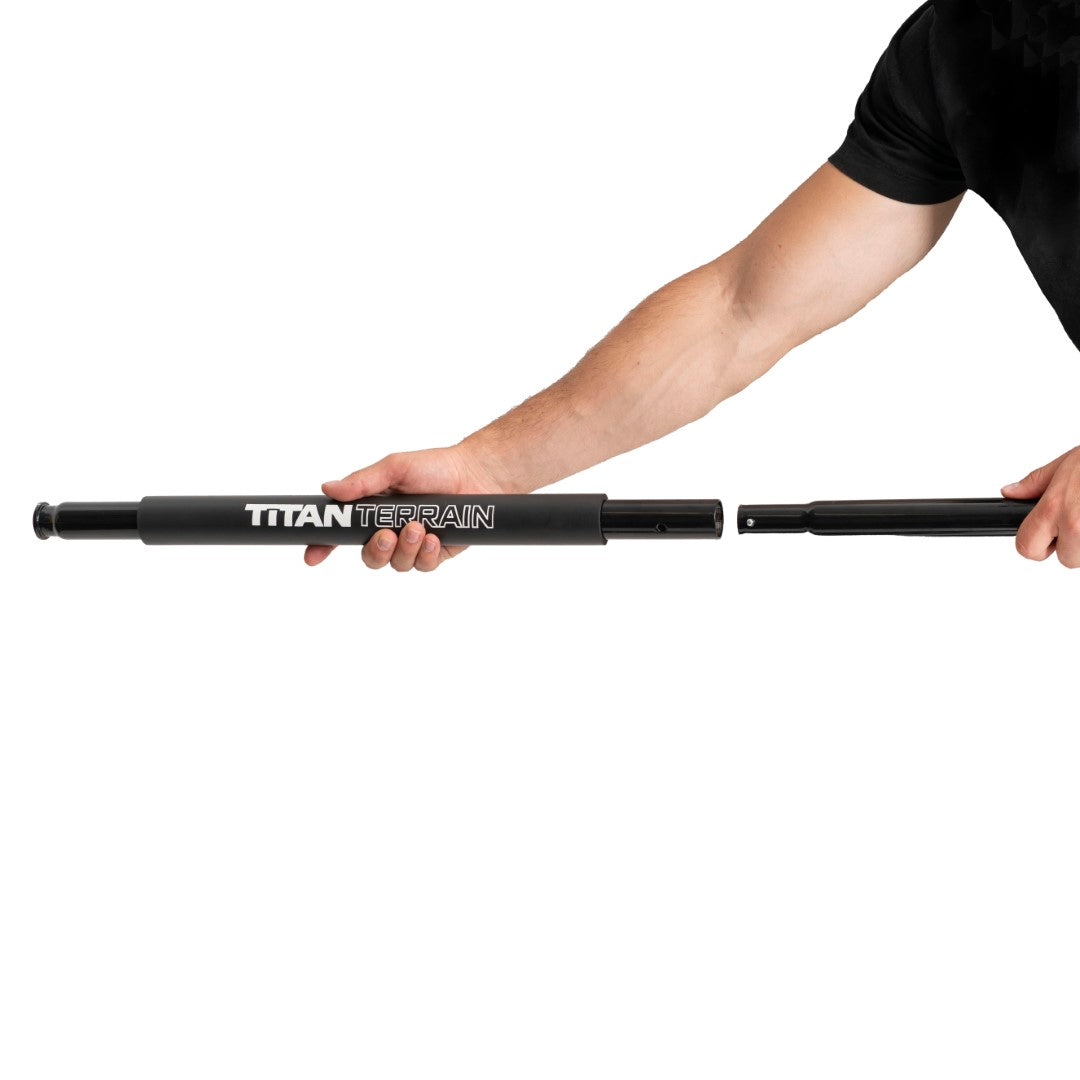 Man assembling Titan Terrain rugged off-road floor jack handle
