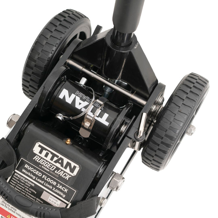 Zoomed in view of Titan Terrain rugged off-road floor jack with jack extension in compartment