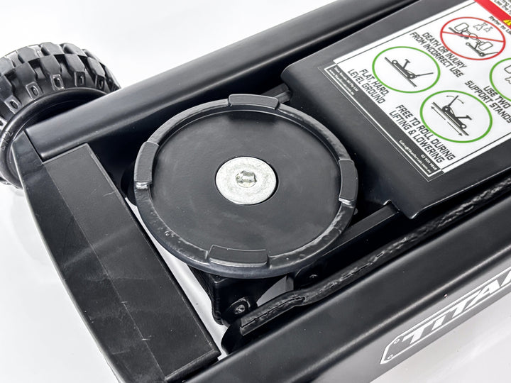 Close-up of a Titan Terrain rugged floor jack jack extension base plate