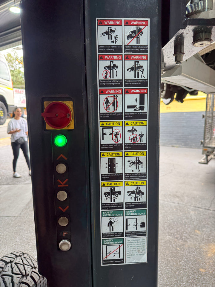 TITAN TERRAIN 4.5 TONNE 2-POST CAR HOIST ELECTRIC LOCK RELEASE