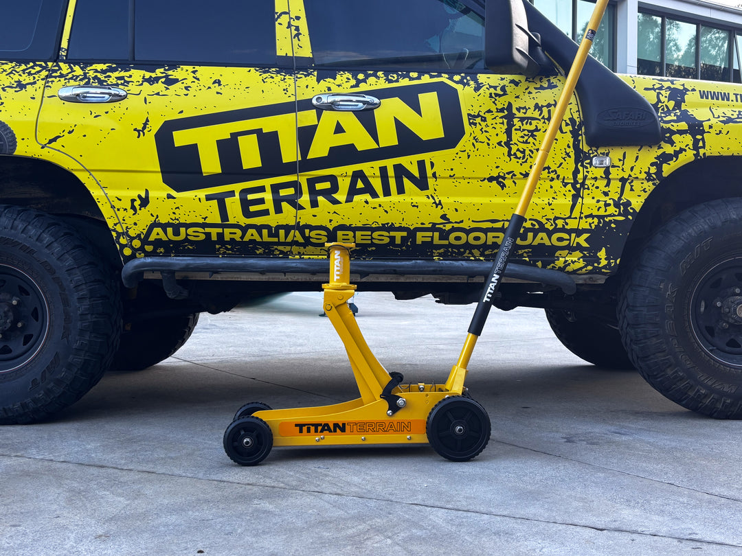 Titan Terrain 3 tonne rugged floor jack in hi-vis yellow